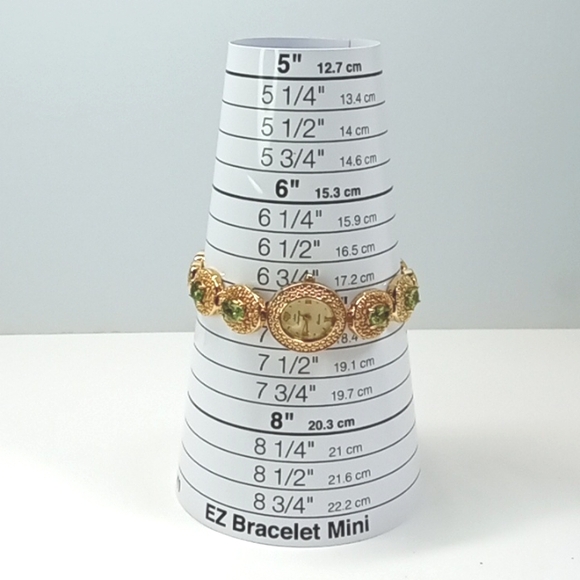 Jules Jurgenson gold toned, with green stones, linked watch. Size: 7 - Picture 6 of 7